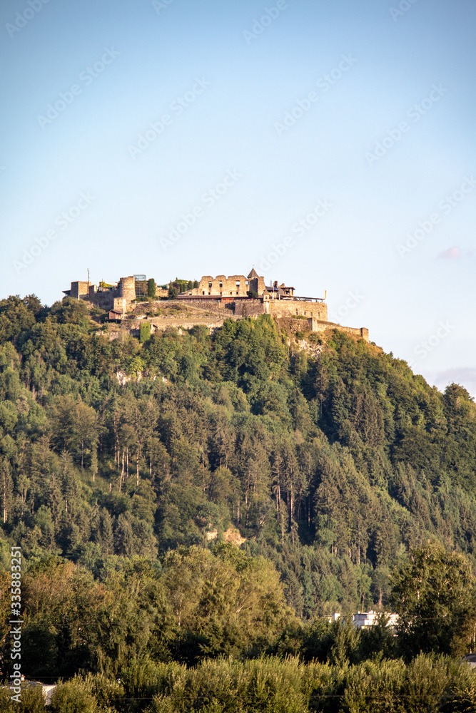 Image of mountains near the town of Villach with castle in summer in the Austrian Alps,