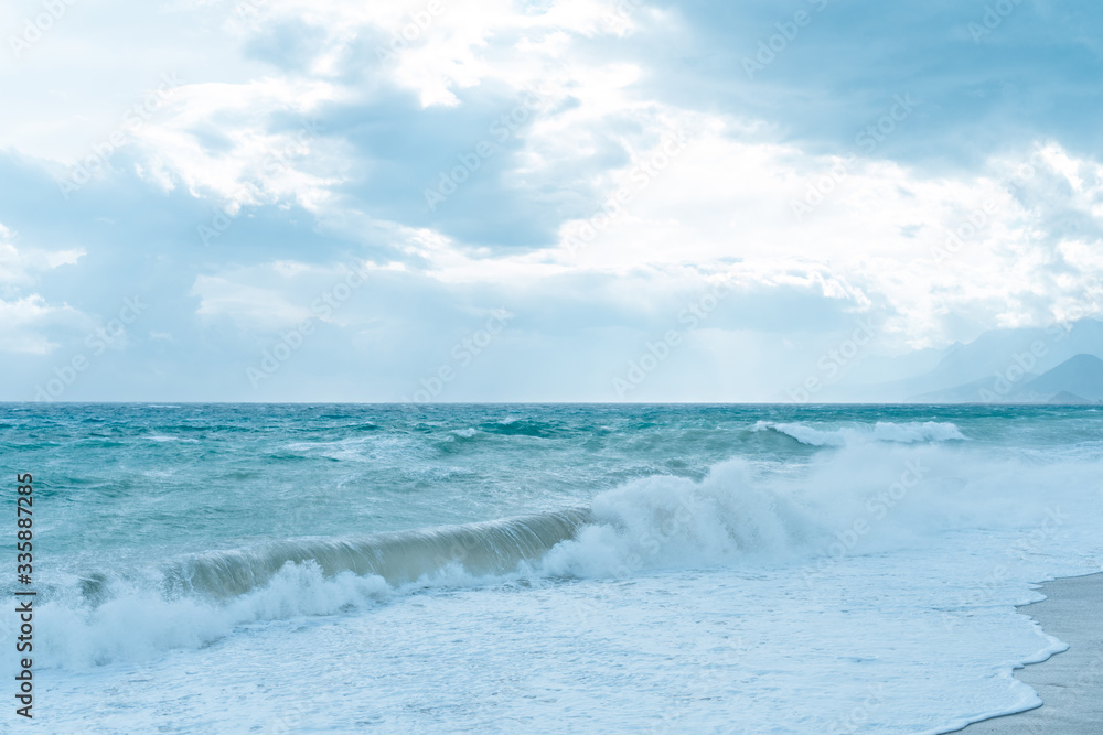 Storm Mediterranean Sea blue sea with clouds and high waves