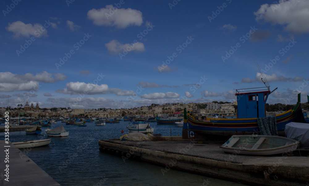 the colorful boats of Marsaxlokk harbor