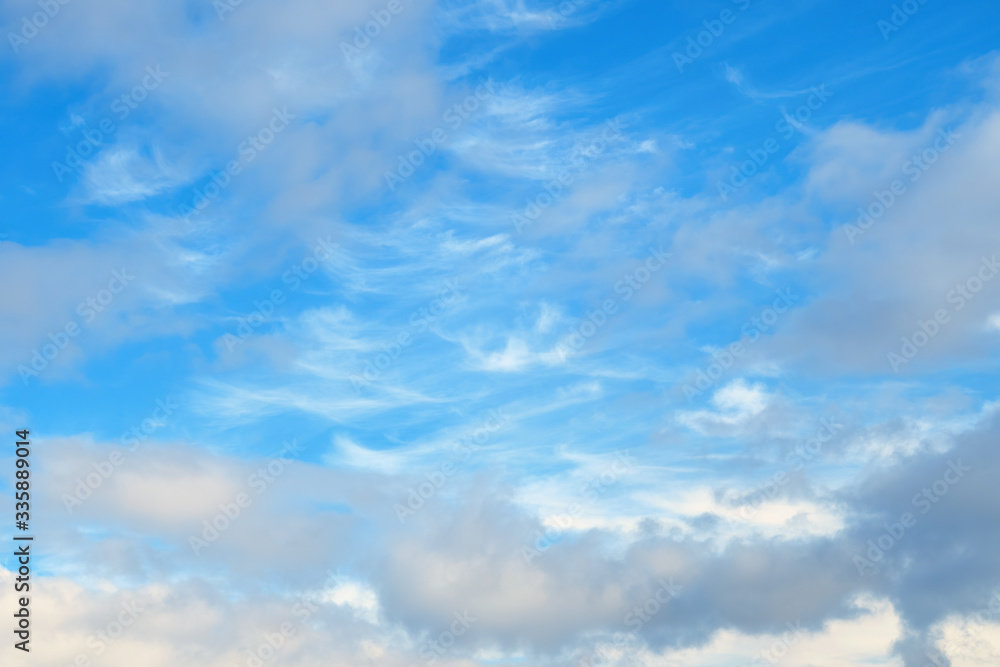 Cirrocumulus and cumulus clouds on blue sky, nature background without focus. Cirrocumulus and cumulus clouds on blue sky, nature background without focus.