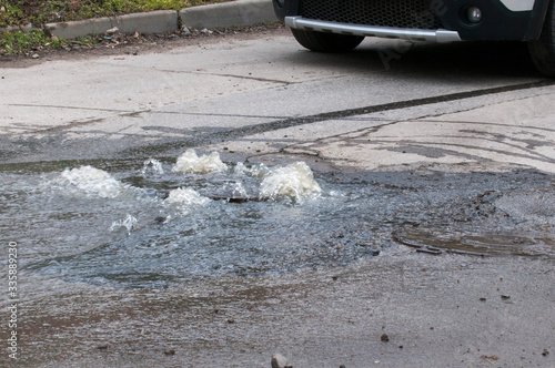 Having poured water supply systems in a sewer well on the road
