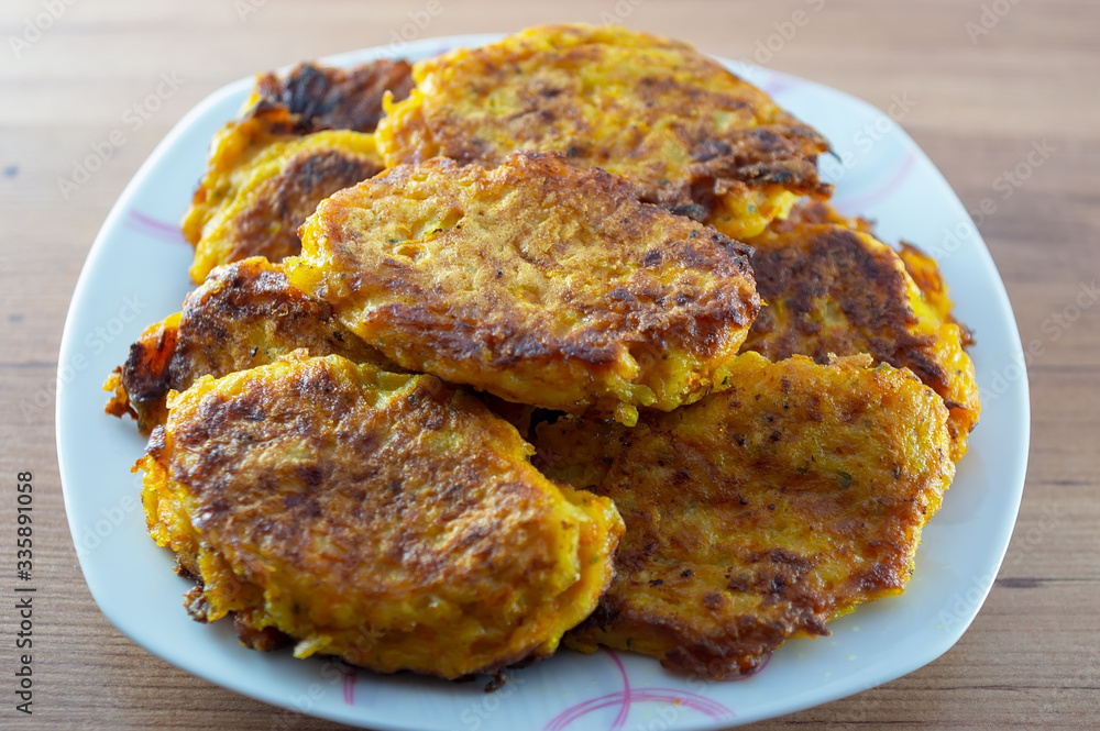 Potato pumpkin burgers, pancakes. Studio Photo cooking Potato pumpkin burgers, pancakes. Studio Photo cooking