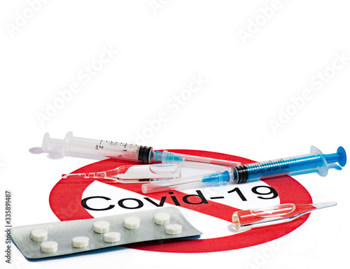 Syringes pills tablets ampoules with medicinal solutions for injection for the treatment of people from the flu pandemic and covid-19