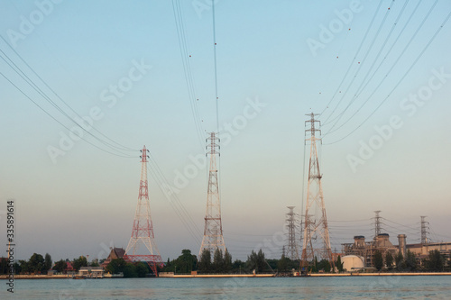 High voltage electricity poles in the evening © vachiraphan