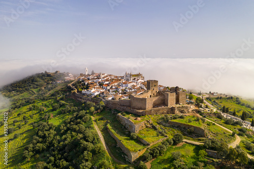 Monsaraz drone aerial view on the clouds in Alentejo, Portugal photo