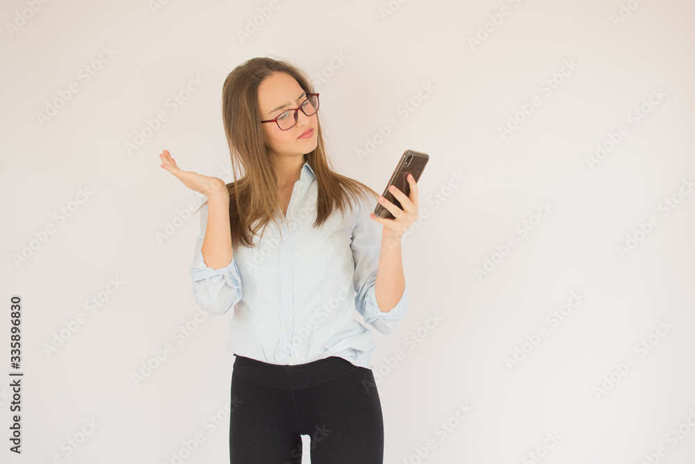 Beautiful young girl with glasses and mobile Beautiful young girl with glasses and mobile