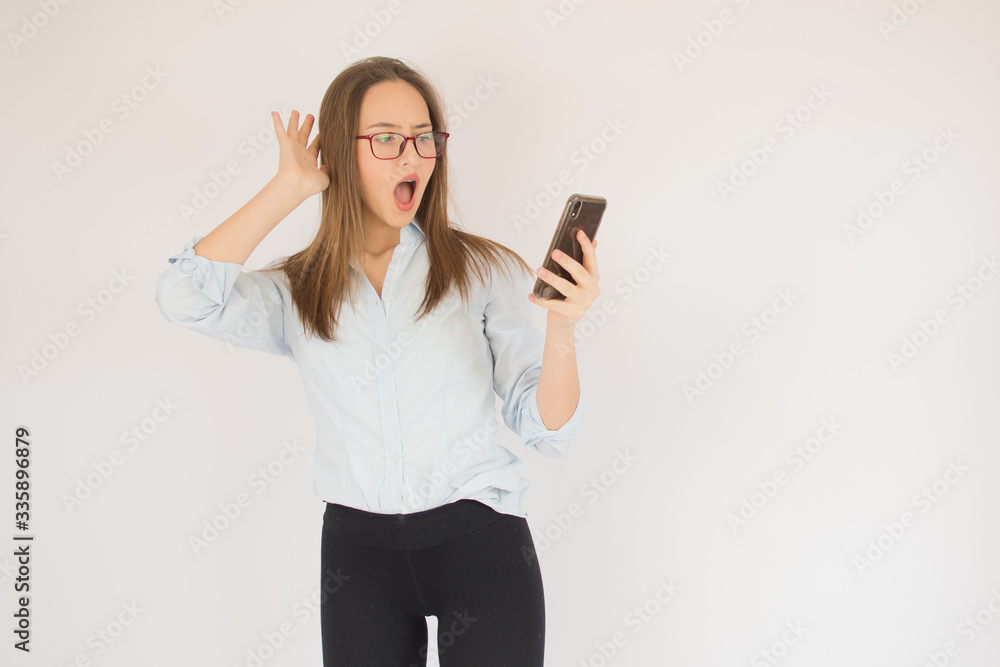 Beautiful young girl with glasses and mobile Beautiful young girl with glasses and mobile