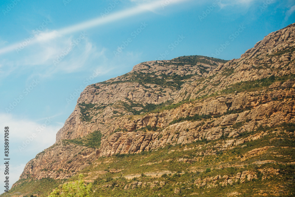 Fototapeta premium A mountain view with monastery on the top in Montserrat, Spain