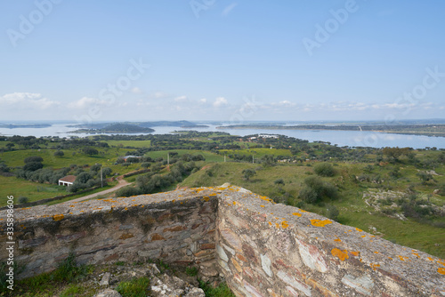 Lake water reservoir of Alqueva Dam landscape from Mourao castle in Alentejo, Portugal