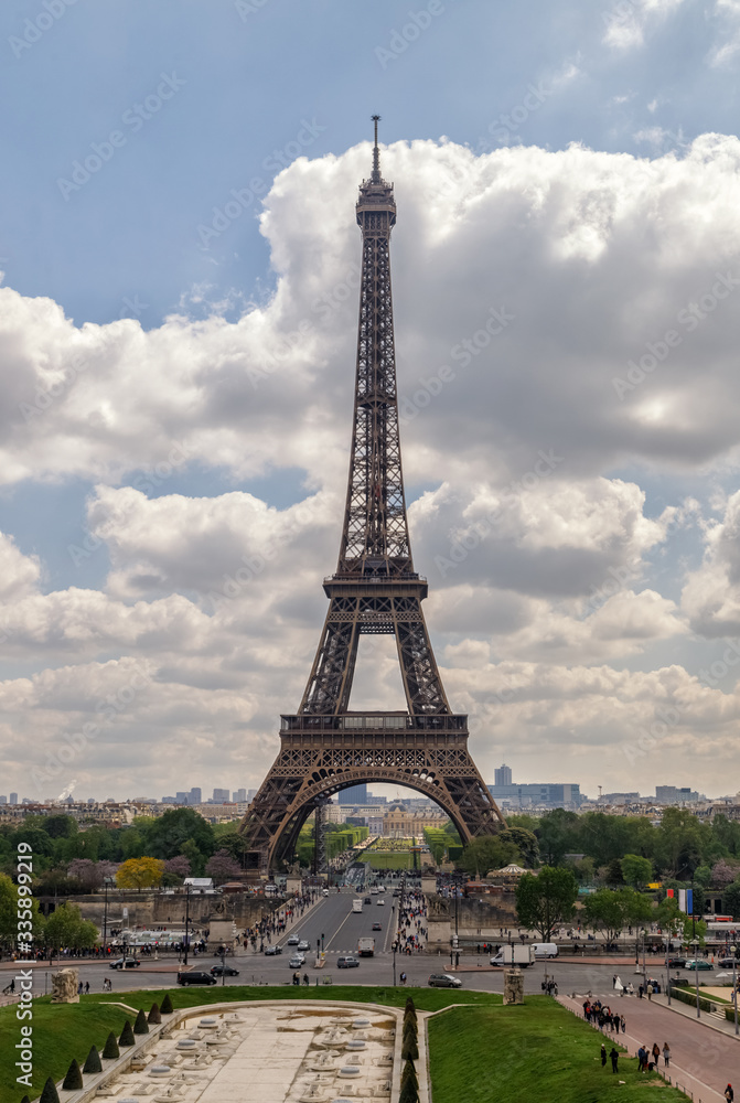 Eiffel tower against cloudy sky. Paris, France.	