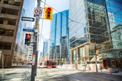 Toronto, Ontario, Canada - April 2, 2020: Downtown Toronto during Coronavirus pandemic. Empty streets of Toronto during rush our.