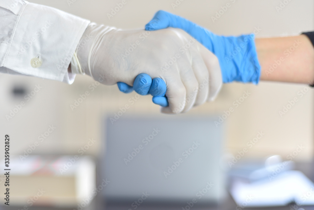 COVID-19. Handshake in the time of the coronavirus (COVID-19). COVID-19. Handshake in the time of the coronavirus (COVID-19).