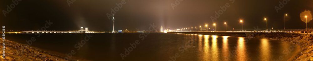 Night view of the Governador Nobre de Carvalho Bridge and Macau Tower Convention and Entertainment Center