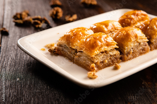 Turkish traditional dessert baklava with pistachio and walnut close up