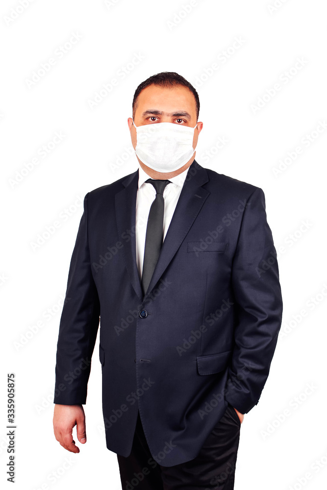 Portrait of businessman in formal wear and medical mask. Isolated Portrait of businessman in formal wear and medical mask. Isolated