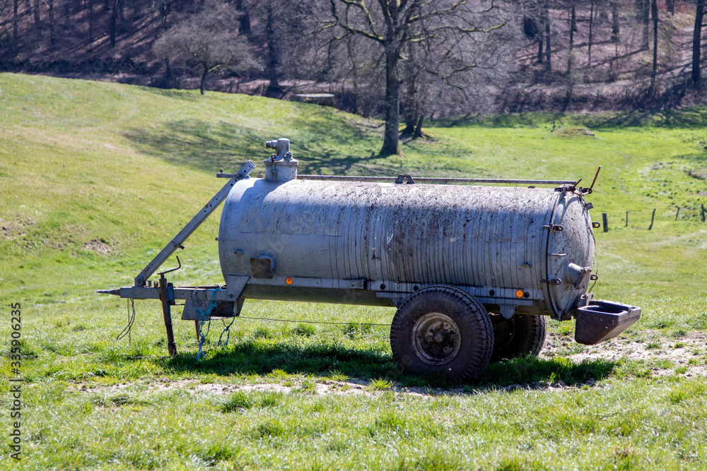 water trailer for cattles on a pasture water trailer for cattles on a pasture