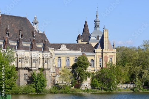 Vajdahunyad Castle in Budapest. The castle is a decoration of Varoshliget park. Vaidahunyad Castle houses the Agricultural Museum. photo