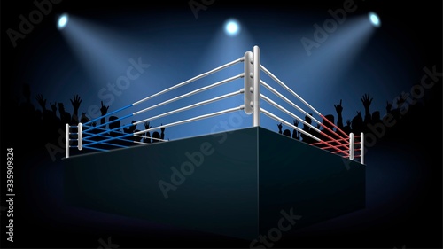 Empty boxing ring in a dark room and crowd, platform for fighting competitions bottom view