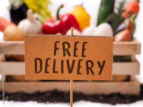 Free delivery written label tag and vegetables box