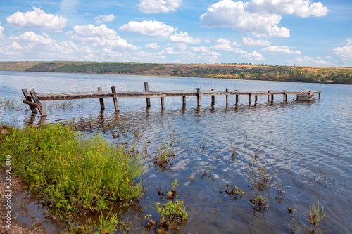 old broken pier made by logs 