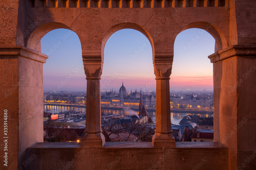 Beautiful view from the Fisherman's Bastion on the Hungarian Parliament at the winter sunrise, Hungary