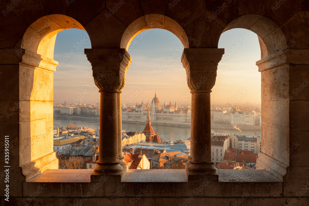 Beautiful view from the Fisherman's Bastion on the Hungarian Parliament at the winter sunrise, Hungary