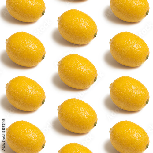 Top view of fresh lemon pattern isolated on white background. Fruit minimal concept. Flat lay.