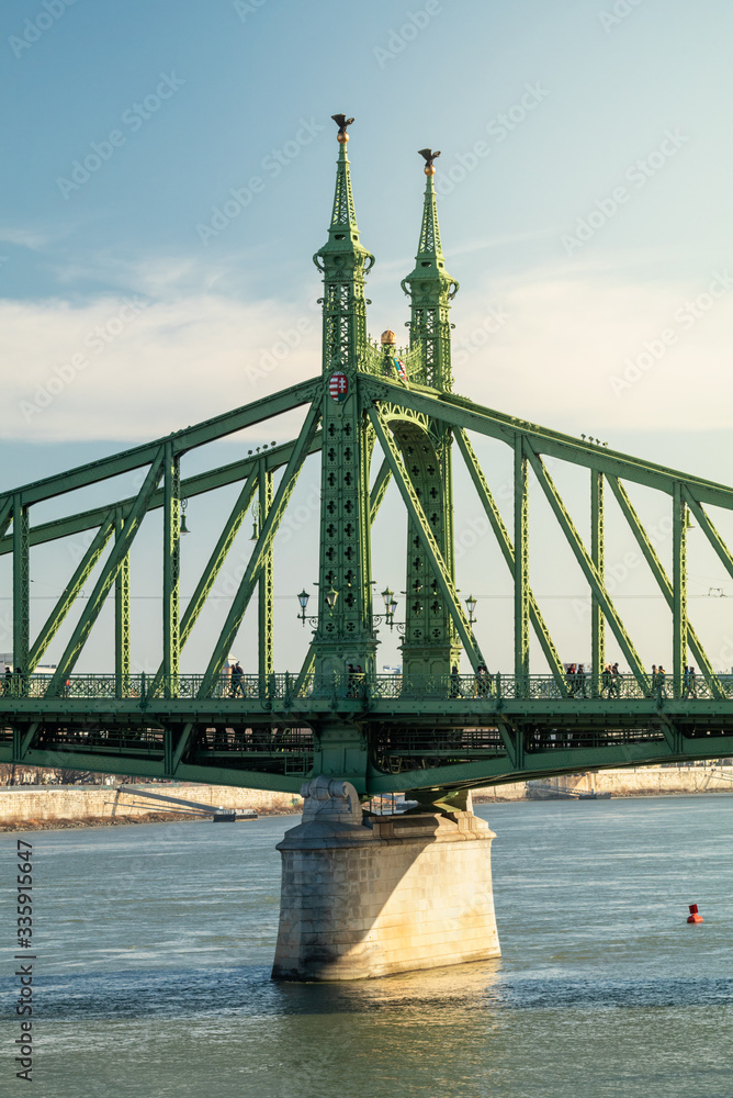 Afternoon light over popular Liberty bridge in budapest, hungary