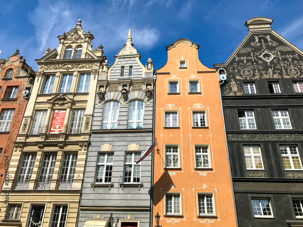 Gdansk, Poland - 21/ 06/ 2019:. Beautiful multi-colored houses in the old town in Gdansk. The central streets of the historic center of Gdansk. The main tourist attraction of Gdansk. 
