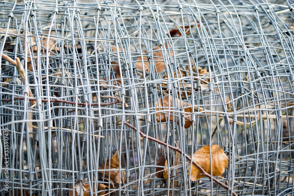 Wire Mesh Fence in Roll Background.