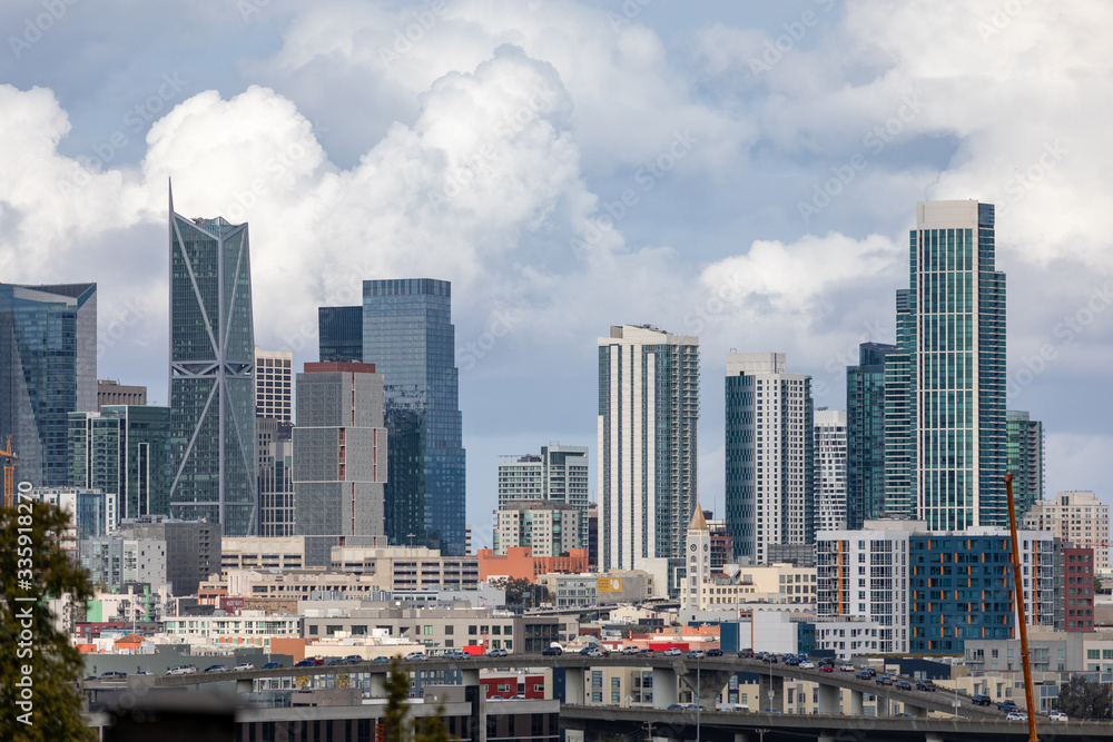 Skyline of buildings with clouds in background Skyline of buildings with clouds in background