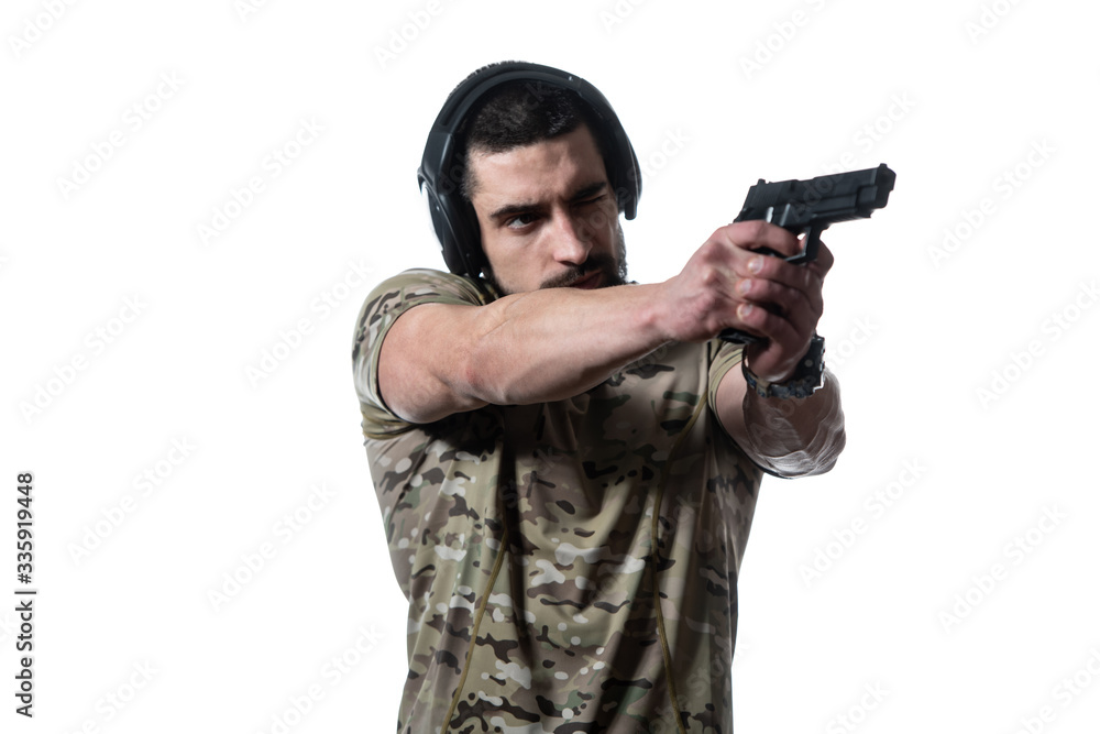 Military Man Holding Gun Isolated on White Background Military Man Holding Gun Isolated on White Background