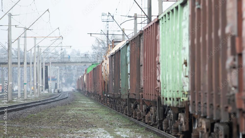 Old rusty wagons on flights. Side view, selective focus. Old rusty wagons on flights. Side view, selective focus.