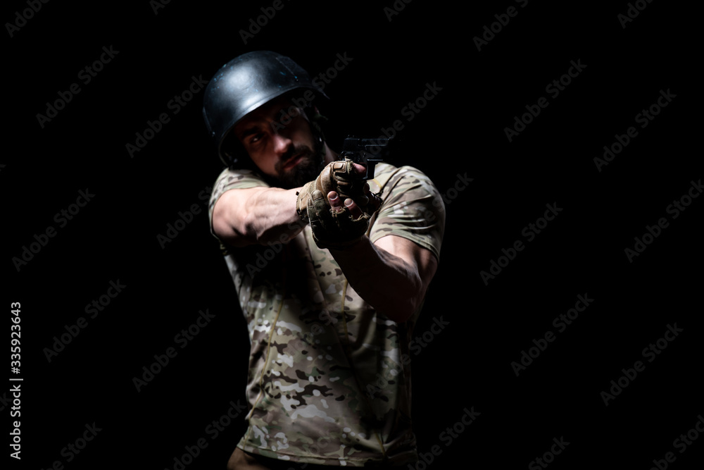 Warrior With Gun on a Black Background