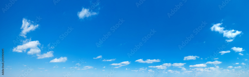 Blue Sky background with tiny Clouds. Panorama background Blue Sky background with tiny Clouds. Panorama background