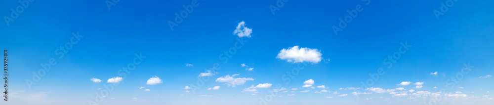 Fototapeta premium Blue sky background. Natural background. Panorama sky with tiny clouds