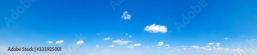 Blue sky background. Natural background. Panorama sky with tiny clouds