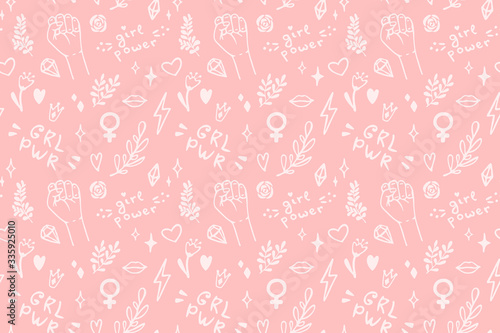Vector seamless pattern with hand drawn elements on feminism theme: raised fist, slogans, symbol, crown, lips, hearts, branches, diamonds, sparks. photo