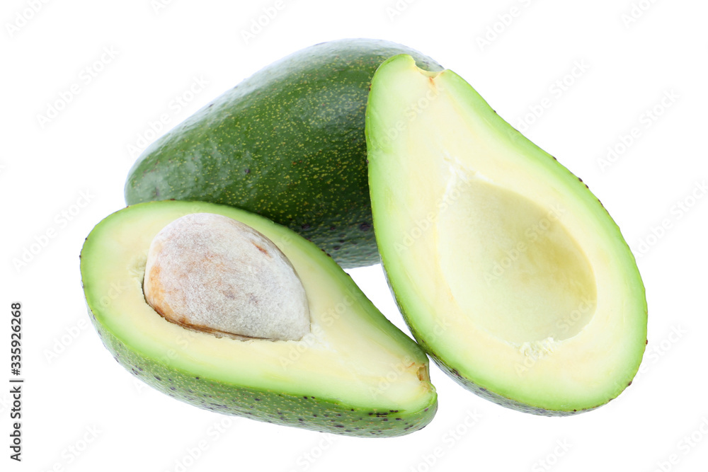 Avocado half cut isolated on white Clipping Path. Professional food photography