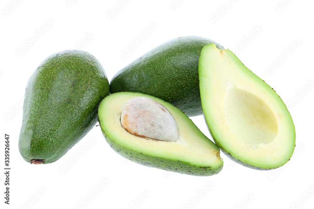 Avocado half cut isolated on white Clipping Path. Professional food photography