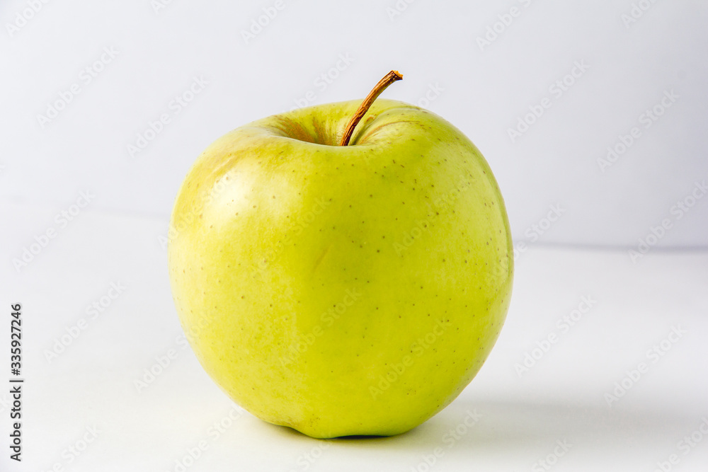 Fresh green apple on a white background. Juicy fruit Fresh green apple on a white background. Juicy fruit