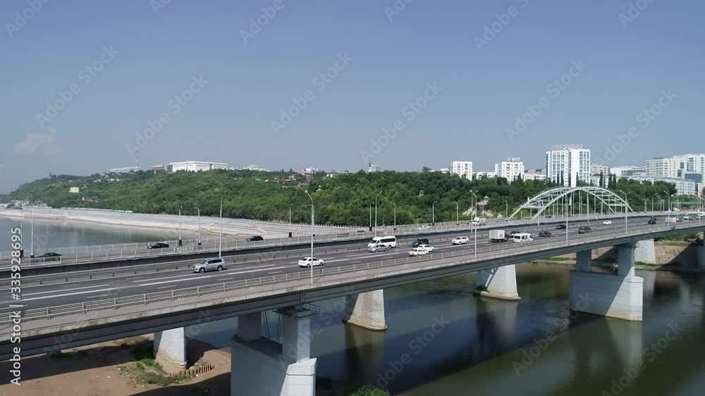 Approaching frame of the bridge with road and machine. Highway transportation. Approaching frame of the bridge with road and machine. Highway transportation.
