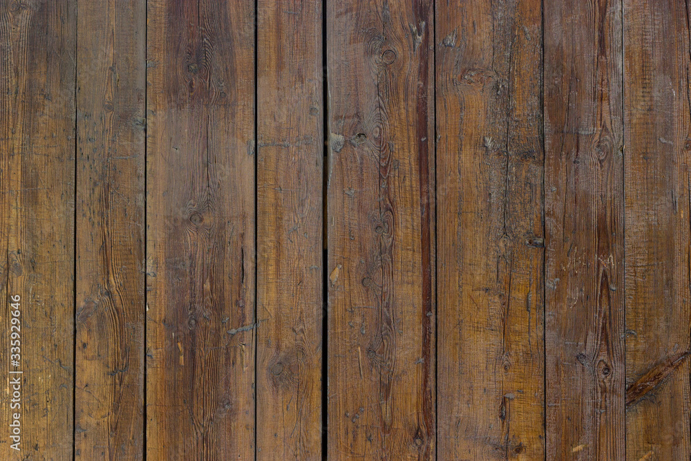 Old grunge true textured wooden background. The surface of the old brown wood wall texture. Old grunge true textured wooden background. The surface of the old brown wood wall texture.