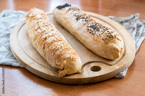 homemade baguette with poppy seeds and sesame