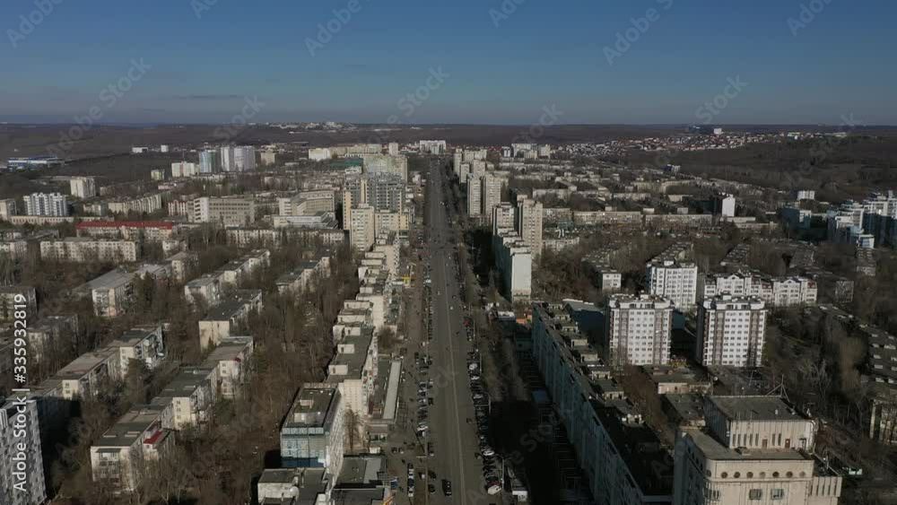 CHISINAU, MOLDOVA - Aerial drone view flight over the Buildings streets and Afghan park . Beautiful warm winter day in Kishinev, Riscani district CHISINAU, MOLDOVA - Aerial drone view flight over the Buildings streets and Afghan park . Beautiful warm winter day in Kishinev, Riscani district
