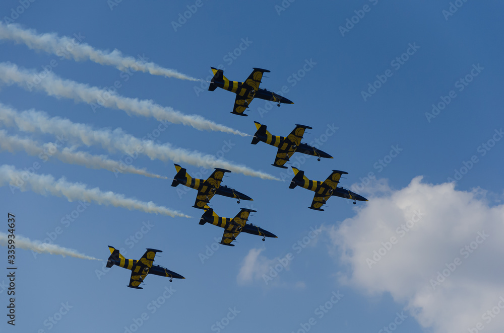 Formation of aircrafts, flying above the clouds