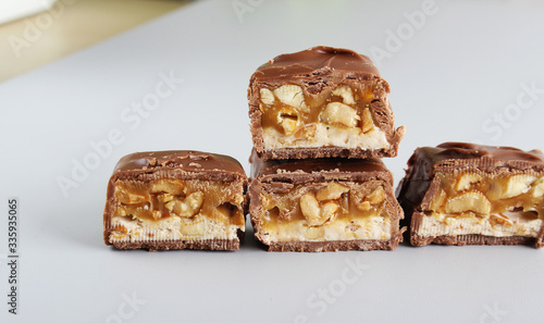 chocolate candy bar with peanuts and nougat