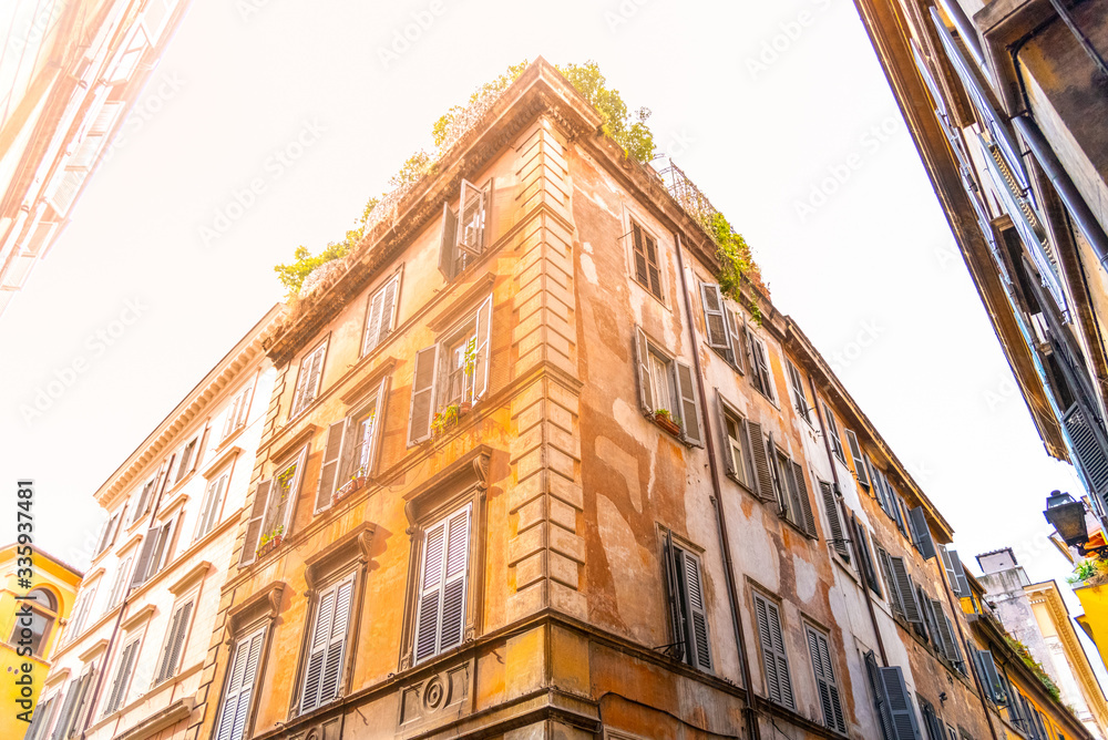 Fototapeta premium Residential houses of Rome. Old town buildings. Street view. Rome, Italy