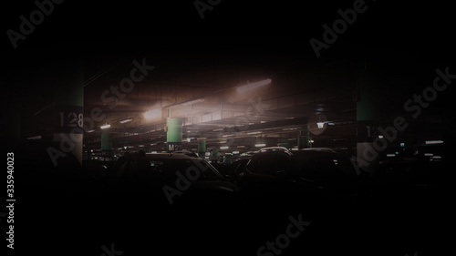 covered parking with cars in dim light, blurred image