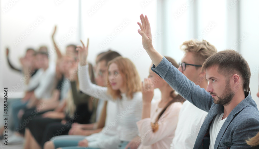 © ASDF - close up. young people ask questions at the youth forum.